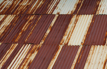 Galvanized matal rust roofing white and  brown color retro backdrop at countryside of Thailand