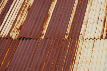 Galvanized metal rust roofing white and  brown color retro backdrop at countryside of Thailand