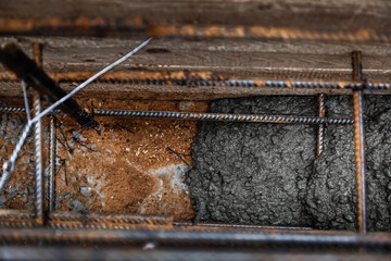 Timber formwork with metal reinforcement for pouring concrete and creating a solid foundation for a...
