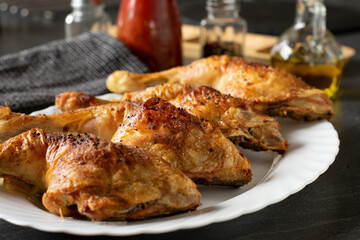 roasted chicken legs on a plate