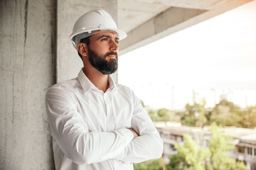 Confident business owner on construction site