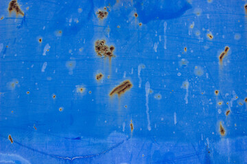 Blue metal plate with some rust spots background texture