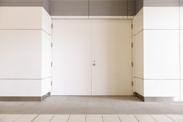 sidewalk by street wall & door