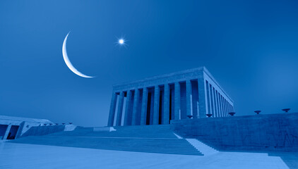 Anitkabir, Mausoleum of Ataturk with dramatic red sunset sky, crescent moon and star in the background - Ankara, Turkey
