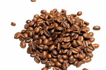 Roasted coffee beans background. Roasted seeds on white background. Copy space 
