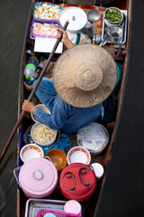 Seller on boat , floating market ,Thailand