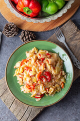 Cabbage meal in dish with vegetables on table. Turkish Food (Zeytinyagli kapuska) from traditional Turkish cuisine .