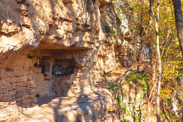 Ancient monastery with place for praying . Monk's room in the rock