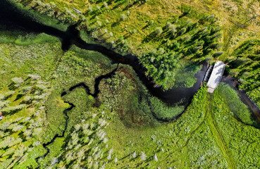 Aerial view of meandering river and forest in Finnish Lapland
