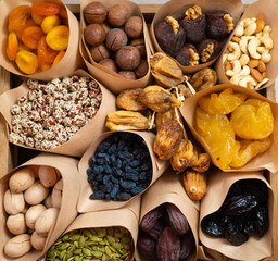 Set of dried fruits top view square close-up background. Healthy vegetarian food nutrition concept.