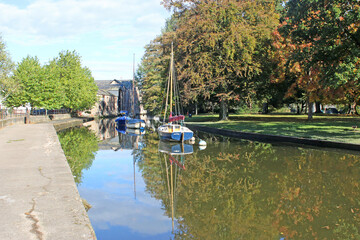 Boats reflected in the River Dart at Totnes	