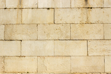 Big yellow stone block background texture