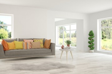 White living room with sofa and summer landscape in window. Scandinavian interior design. 3D illustration
