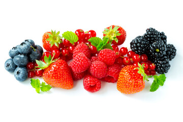 Mix of ripe berries isolated on the white background. A heap of strawberries, blueberries, raspberries, blackberries, and red currants reach of vitamins for healthy eating.