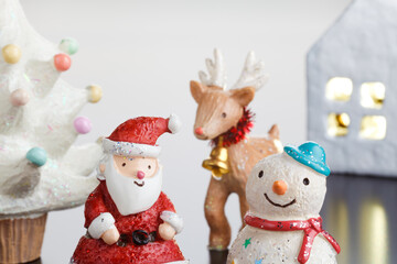 聖夜のイメージ（サンタクロースとスノーマンとトナカイ）