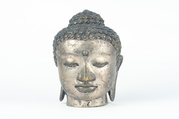 Fototapeta na wymiar Isolated silver Buddah head statue