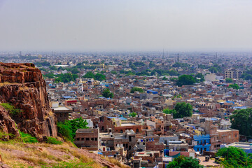 Fototapeta na wymiar Panoramic view of Sun city Jodhpur also known as 'Blue City' due to the vivid blue-painted Brahmin houses. It is a popular tourist destination & second largest city in State of Rajasthan, India.