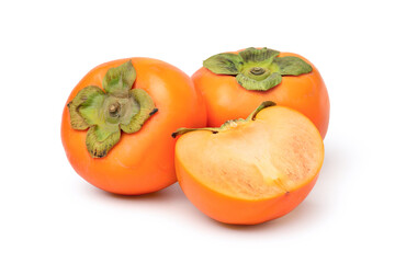 Persimmon fruit with cut in half isolated on white background. clipping path.