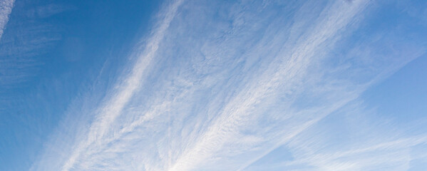 Image of a partly cloudy and partly clear sky during the day