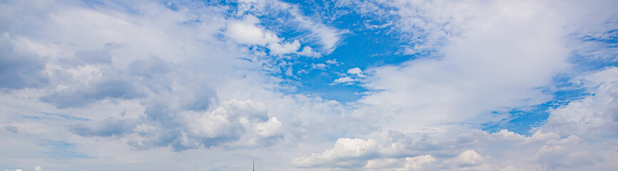 Image of a partly cloudy and partly clear sky during the day