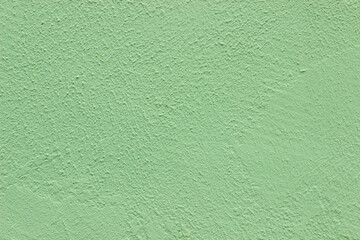 Light green plaster work wall texture background newly painted