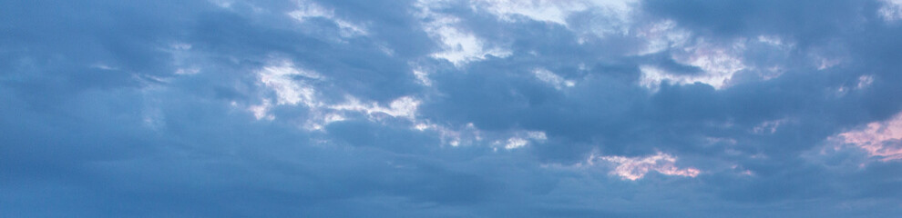 Image of a partly cloudy and partly clear sky during the day