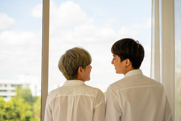 Asian lovers in the bed room new normal love. same sex marriage concept. LGBTQ concept. 