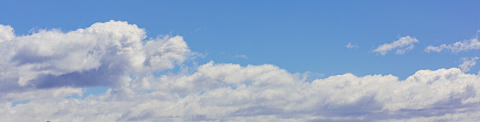 Image of a partly cloudy and partly clear sky during the day