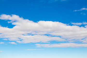 Image of a partly cloudy and partly clear sky during the day