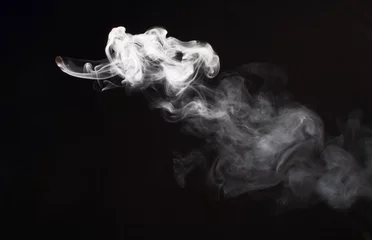 Zelfklevend Fotobehang White flow smoke blot on black background. © Liliia