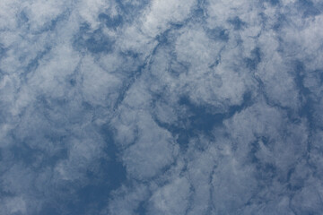 Image of a partly cloudy and partly clear sky during the day