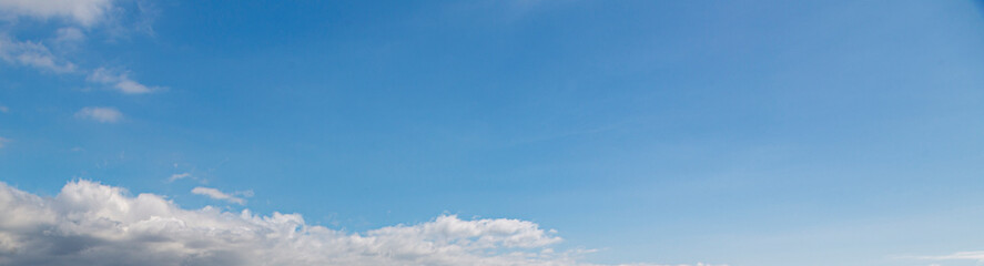 Image of a partly cloudy and partly clear sky during the day