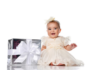 picture of baby boy in diaper with big gift box