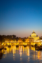 Fototapeta premium Sunset on Tiber river bridge with Vatican City - Rome, Italy