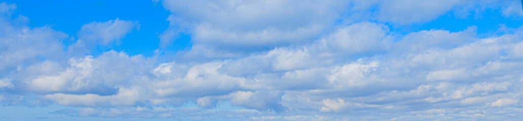 Image of a partly cloudy and partly clear sky during the day