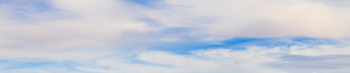 Image of a partly cloudy and partly clear sky during the day