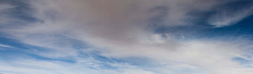 Image of a partly cloudy and partly clear sky during the day