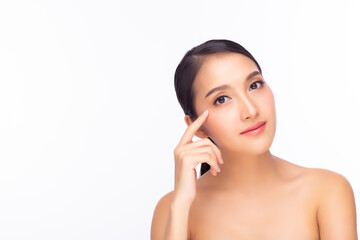 Young female with clean fresh skin. Beauty face woman touching near eye Young female with clean fresh skin, Plastic Surgery anti-aging and facial treatment concept.