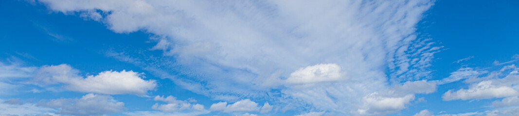 Image of a partly cloudy and partly clear sky during the day