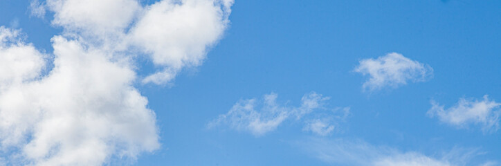 Image of a partly cloudy and partly clear sky during the day