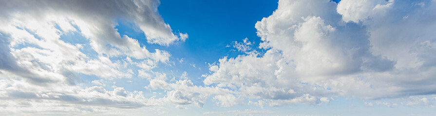 Image of a partly cloudy and partly clear sky during the day