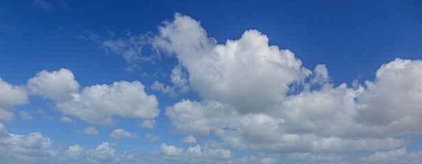 Image of a partly cloudy and partly clear sky during the day