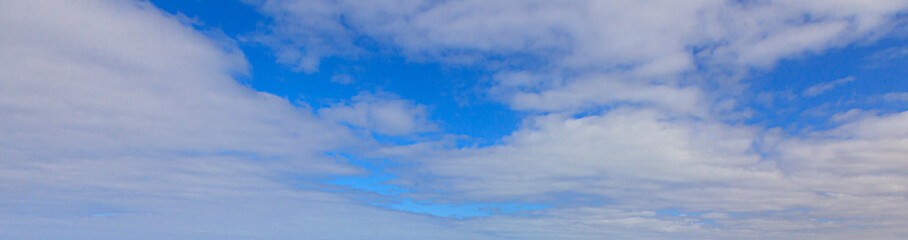 Image of a partly cloudy and partly clear sky during the day