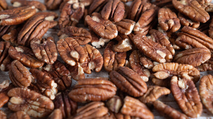 Pecan nuts background. Close up of healthy delicious pecan nuts for energy and healthy living