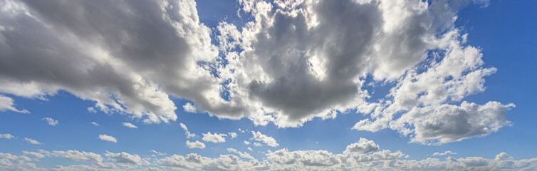 Image of a partly cloudy and partly clear sky during the day