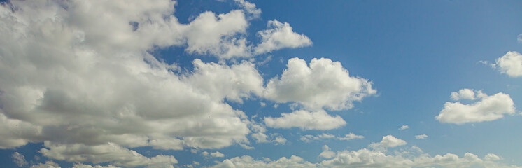 Image of a partly cloudy and partly clear sky during the day