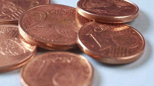 1 and 2 euro cent coins macro view with selective focus. Suitable for the Uniform rounding rules for cash payments and circulation of 1 and 2 cent coins public consultation from european comission.