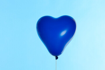 Obraz na płótnie Canvas 青いハートの風船