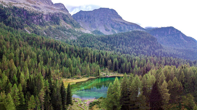 lake san pellegrino. Lago San Pellegrino (Lech de San Pelegrin) at Passo San Pellegrino in the Dolomites. Italy. aerial photography