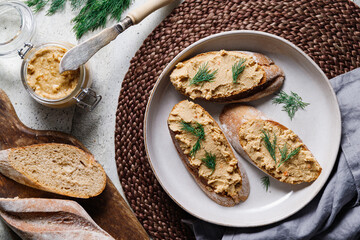 Toasts with pate and fresh drill. Healthy appetizer. Top view, flat lay composition.